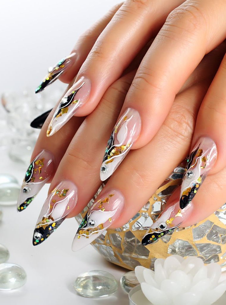 Female hands with manicure  and beautiful design on  nails.